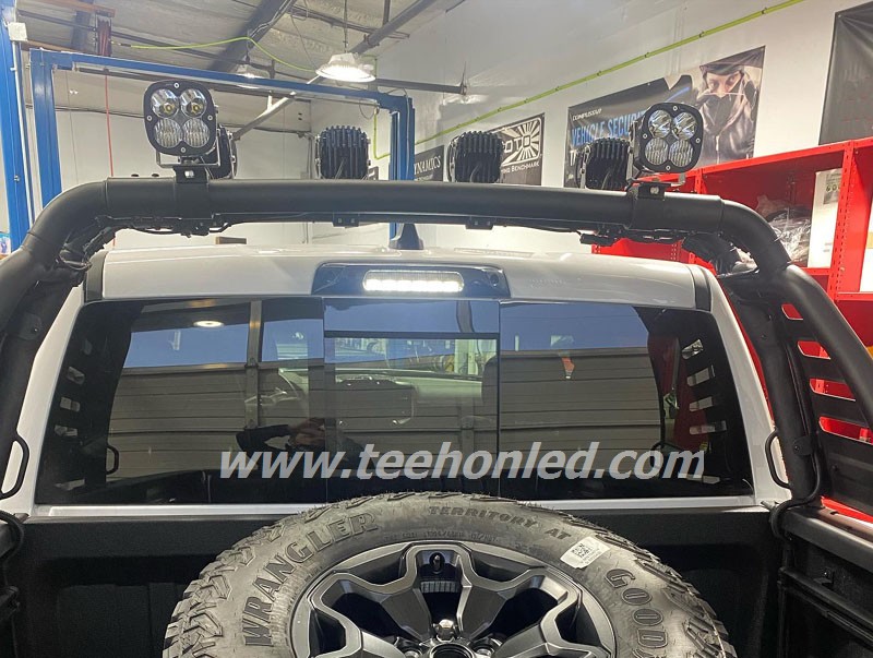 installing the 40w led work lamp on the back grille of jeep